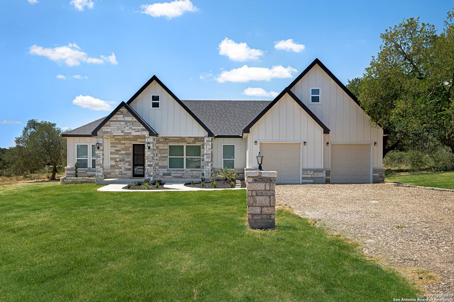 Front exterior of a new home in , Lytle, TX, highlighting curb appeal (Image 23). Front exterior of a new home in , Lytle, TX, highlighting curb appeal (Image 23).