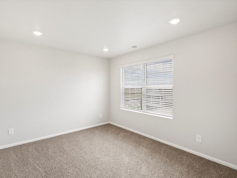 Spacious, unfurnished interior of a new home in Buffalo Highlands: The Flora Collection, Commerce City (Image 17).