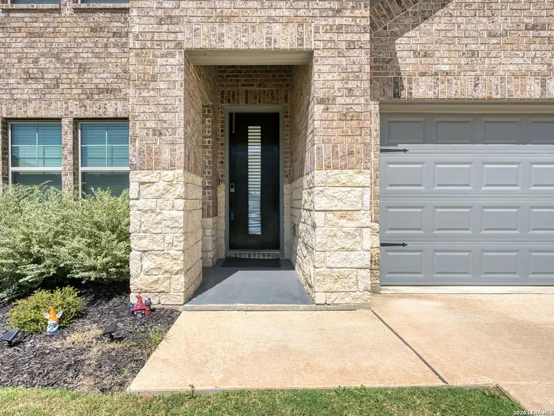 Exterior details and patio area of a home in Autry Pond, San Antonio (Image 22).