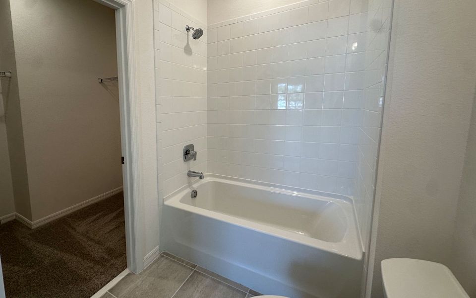 Furnished interior view inside a new home in Trinity Gardens, Deland (Image 6).