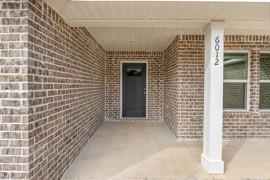 Exterior details and patio area of a home in Southern Day Chateau, Baker (Image 3).