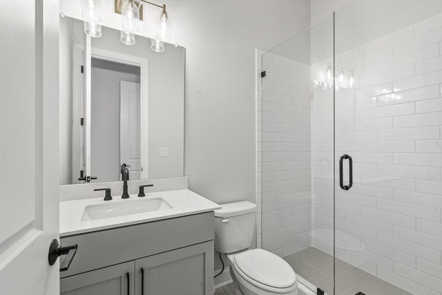 Representative furnished interior of a home built from the The Osbourne by The Providence Group in Waterhaven, Cumming (Image 13).