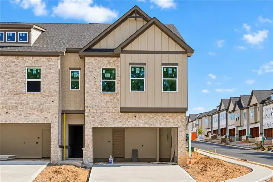 Front exterior of a new home in , Norcross, GA, highlighting curb appeal (Image 2). Front exterior of a new home in , Norcross, GA, highlighting curb appeal (Image 2).