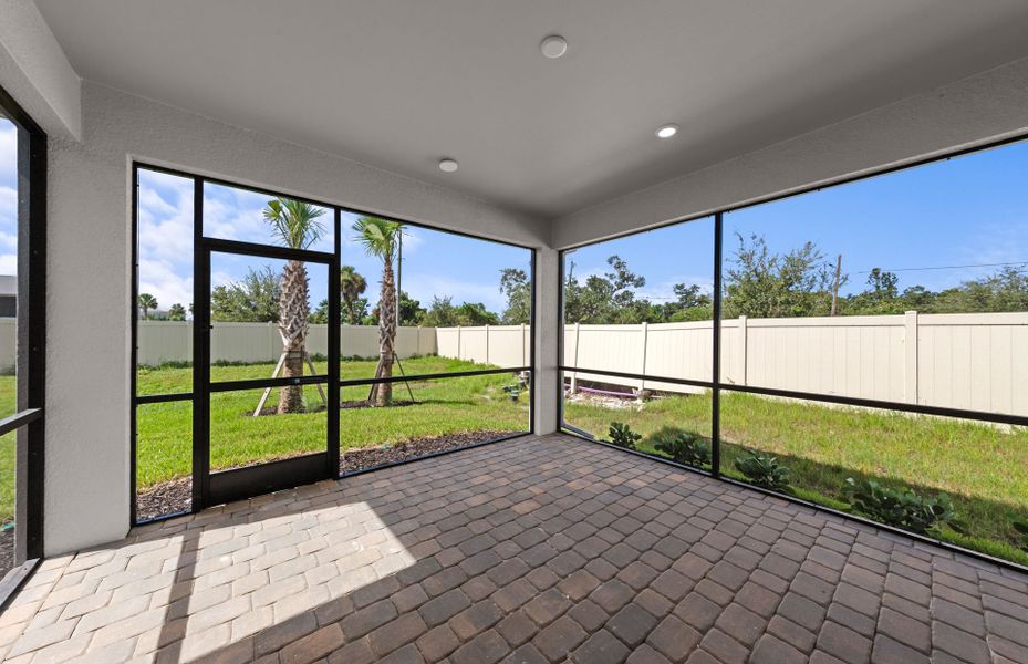 Exterior details and patio area of a home in Legacy Groves, Nokomis (Image 3).