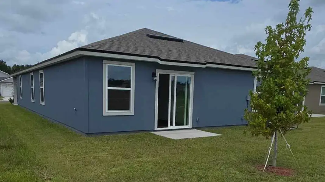 Exterior details and patio area of a home in The Arbors, Jacksonville (Image 3). Exterior details and patio area of a home in The Arbors, Jacksonville (Image 3).