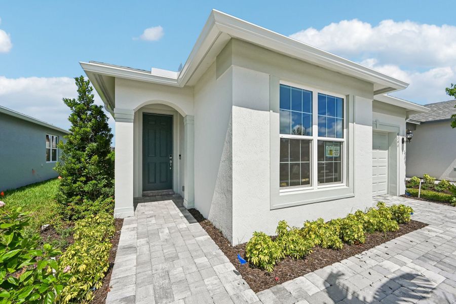 Exterior details and patio area of a home in Harbor Isle, Vero Beach (Image 30).