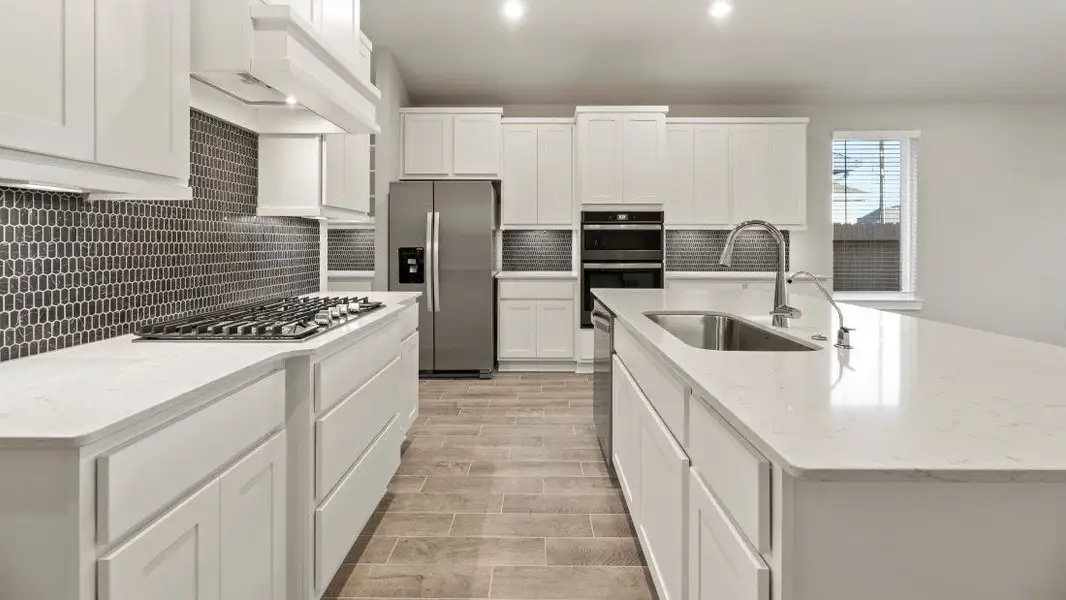 Representative furnished interior of a home built from the Colby by D.R. Horton in Westland Ranch 50' Homesites, League City (Image 6).