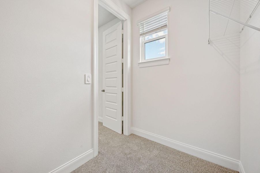 Spacious, unfurnished interior of a new home in Brystol at Wylder - Reserve Series, Port St. Lucie (Image 36).