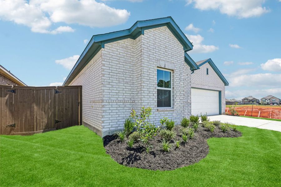 Exterior details and patio area of a home in Harrington Trails, New Caney (Image 2). Exterior details and patio area of a home in Harrington Trails, New Caney (Image 2).