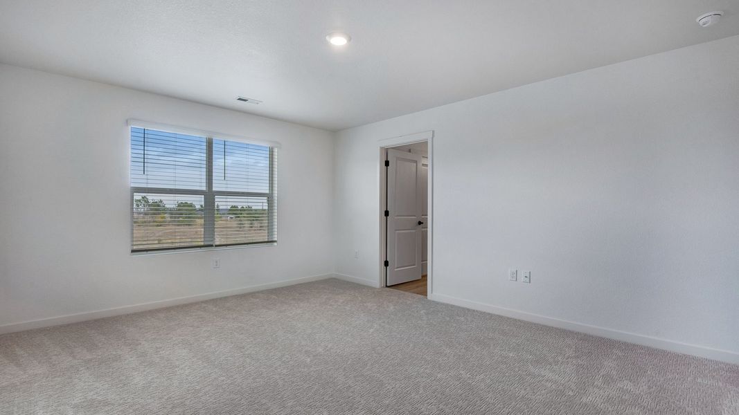 Spacious, unfurnished interior of a new home in Trails at Crowfoot, Parker (Image 22).