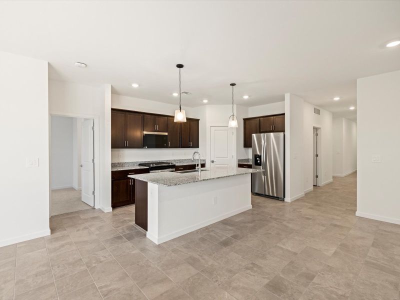Furnished interior view inside a new home in Rancho Mirage Estate Series, Maricopa (Image 3).