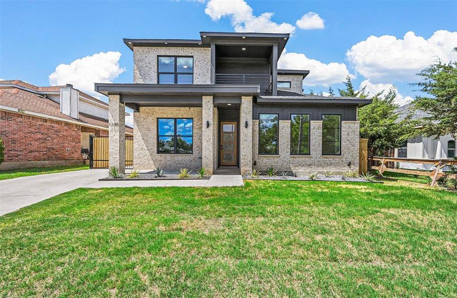 View of front of home with a front lawn