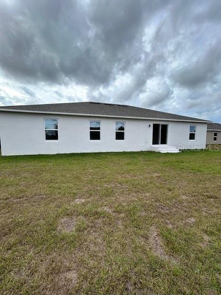 Exterior details and patio area of a home in Port Charlotte, Port Charlotte (Image 2). Exterior details and patio area of a home in Port Charlotte, Port Charlotte (Image 2).