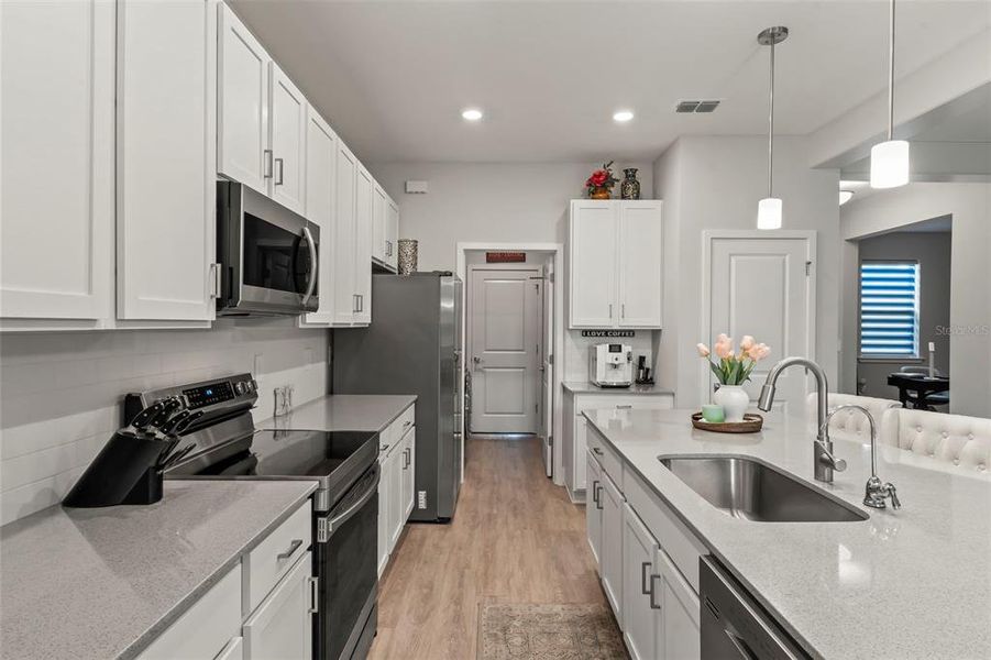 Furnished interior view inside a new home in , North Port (Image 17).