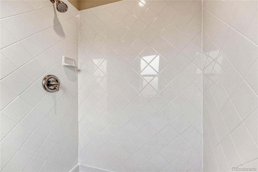 Full tile surround in shower Full tile surround in shower