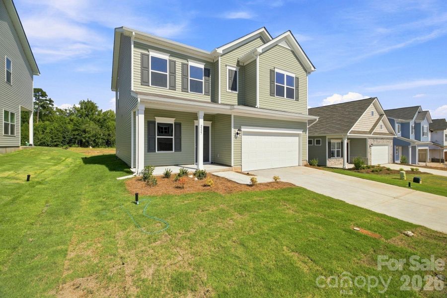 Front exterior of a new home in Catawba Trace, Catawba, NC, highlighting curb appeal (Image 23).