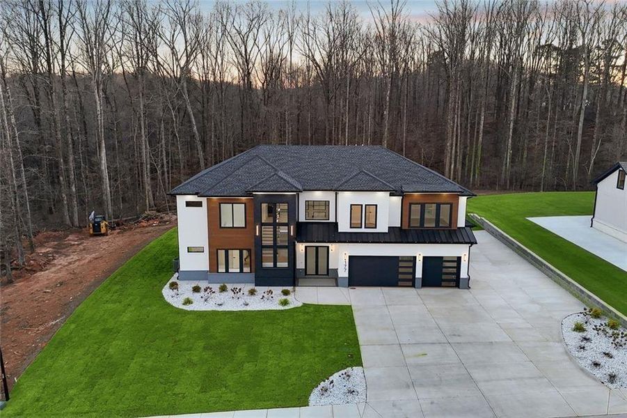 Front exterior of a new home in , Auburn, GA, highlighting curb appeal (Image 32).