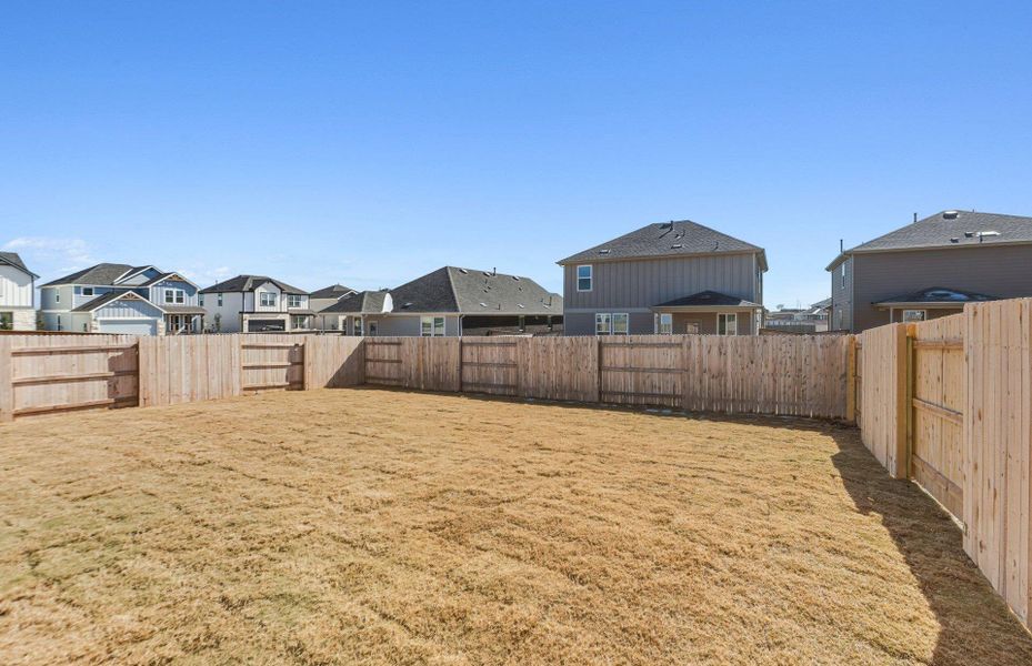 Exterior details and patio area of a home in Patterson Ranch, Georgetown (Image 16).