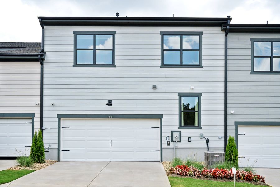 Front exterior of a new home in Seven Oaks, Belmont, NC, highlighting curb appeal (Image 22).