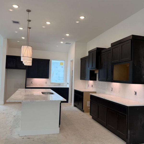 Furnished interior view inside a new home in Wood Leaf Reserve, Tomball (Image 3).