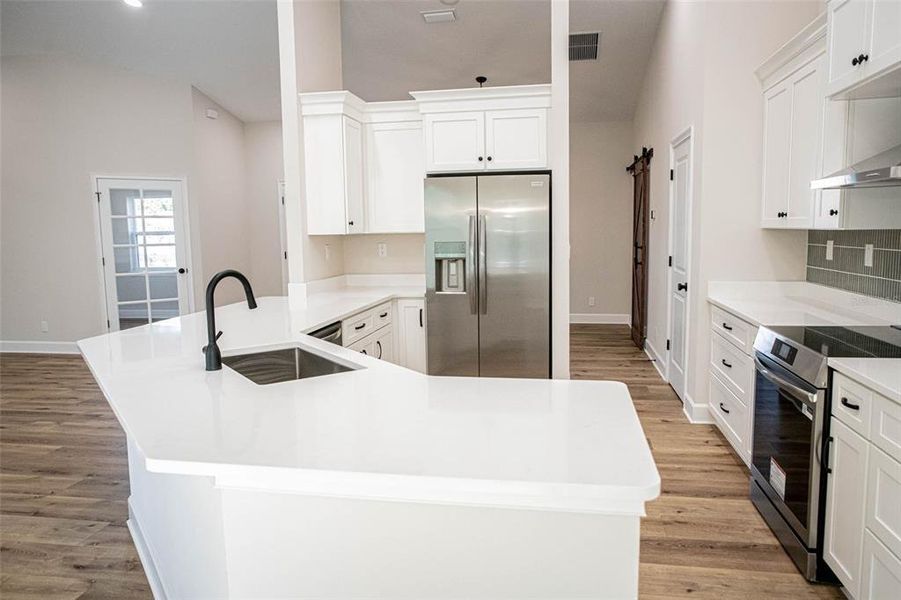 Furnished interior view inside a new home in , Weeki Wachee (Image 5).