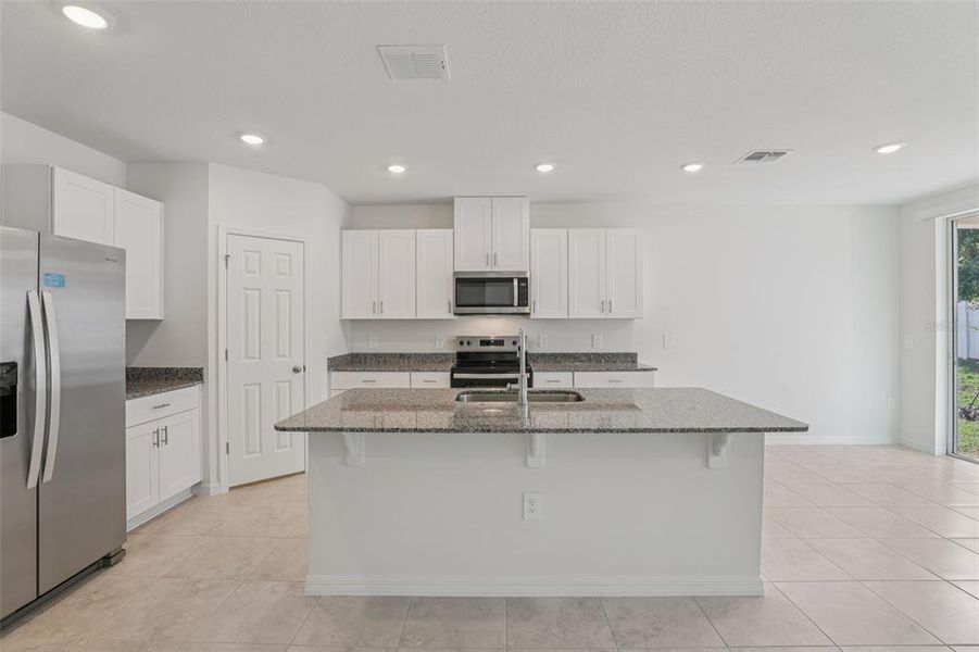 Furnished interior view inside a new home in Deer Run at Crosswinds, Davenport (Image 9).