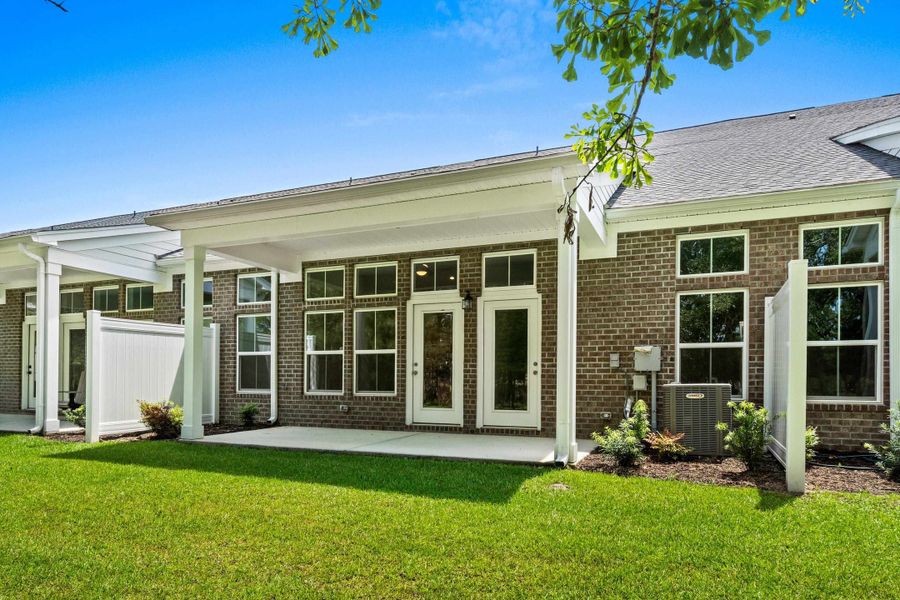 Exterior details and patio area of a home in Long Bay Golf Club, Longs (Image 24).