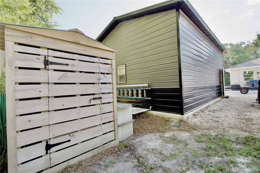 Exterior details and patio area of a home in , Brooksville (Image 24).