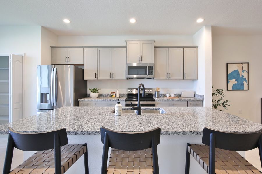 Representative furnished interior of a home built from the Morgan by Neal Communities in SkySail, Naples (Image 27).