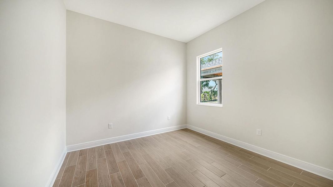 Spacious, unfurnished interior of a new home in Canoe Creek Real Estate and Homes for Sale in Parrish, FL - Neal Communities, Parrish (Image 47).