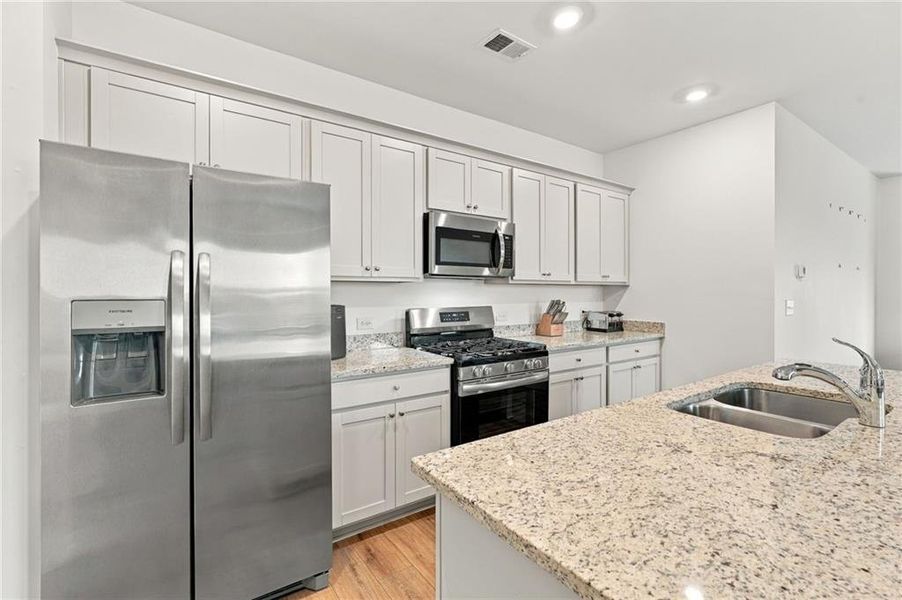 Furnished interior view inside a new home in Heritage Point, Hampton (Image 12).