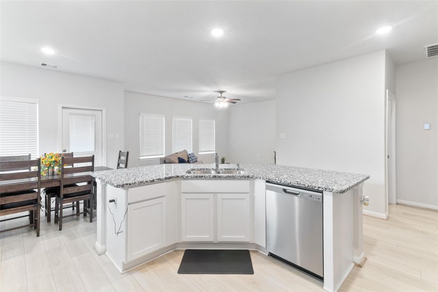 This modern kitchen features sleek stainless steel appliances and a spacious open layout, perfect for entertaining. This modern kitchen features sleek stainless steel appliances and a spacious open layout, perfect for entertaining.