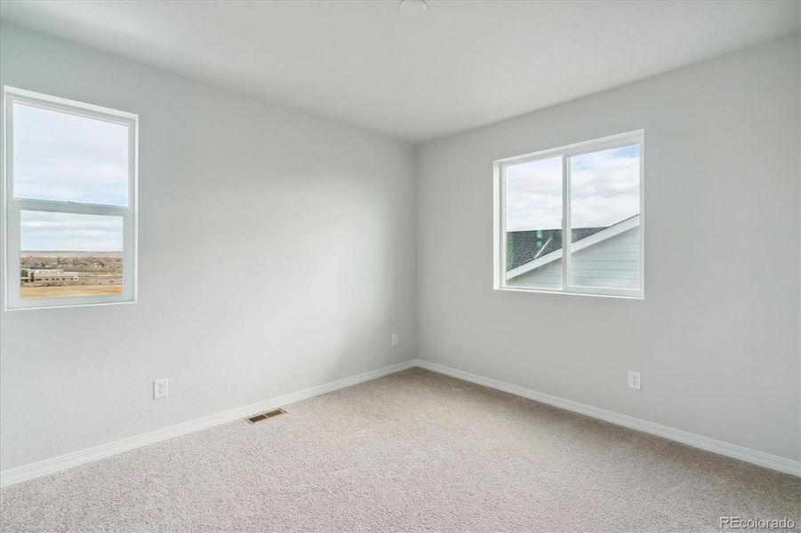 Spacious, unfurnished interior of a new home in Bradley Heights, Colorado Springs (Image 13).