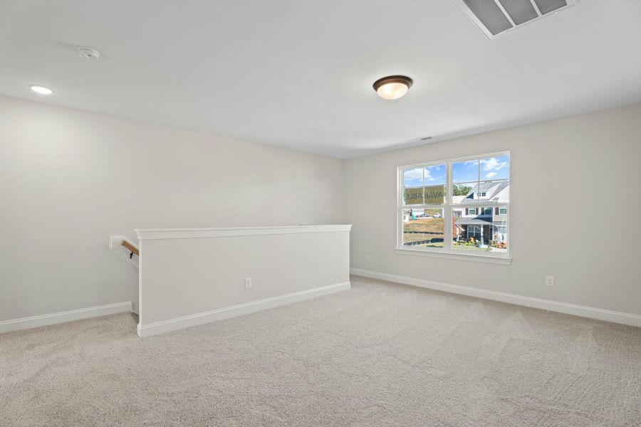 Spacious, unfurnished interior of a new home in Cottages at Piper Village, Trinity (Image 17).