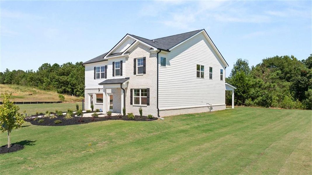 Exterior details and patio area of a home in Bridle Creek, Locust Grove (Image 2). Exterior details and patio area of a home in Bridle Creek, Locust Grove (Image 2).