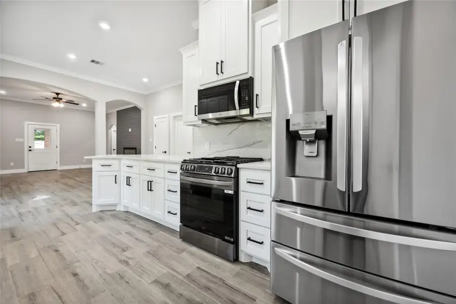Lots of cabinet and counter space! Soft close cabinets and drawers.