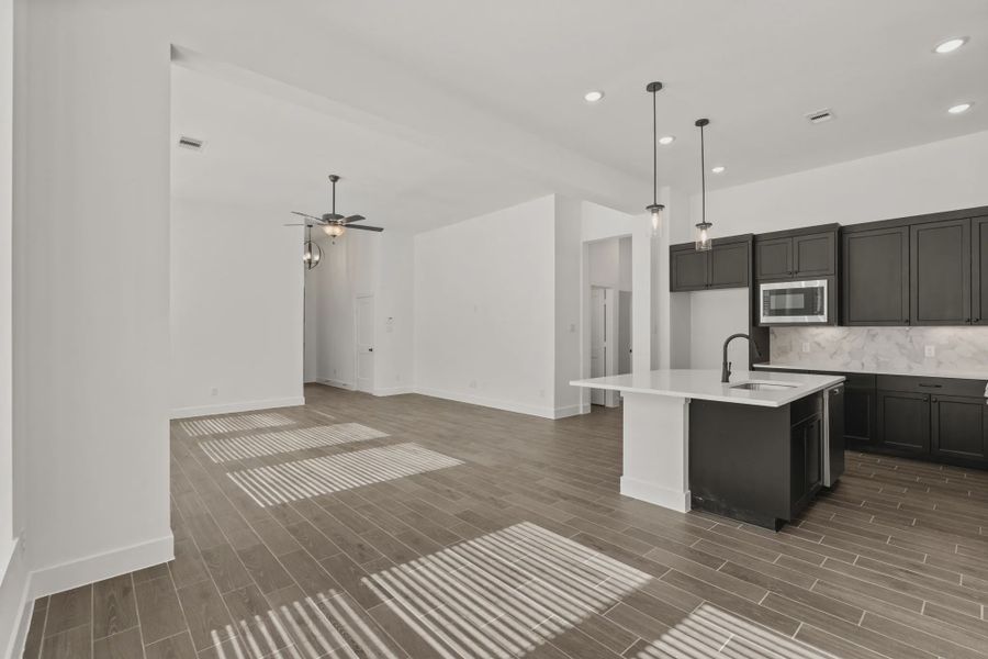 Representative furnished interior of a home built from the Rowen by Chesmar Homes in Brookewater 45's, Rosenberg (Image 8).