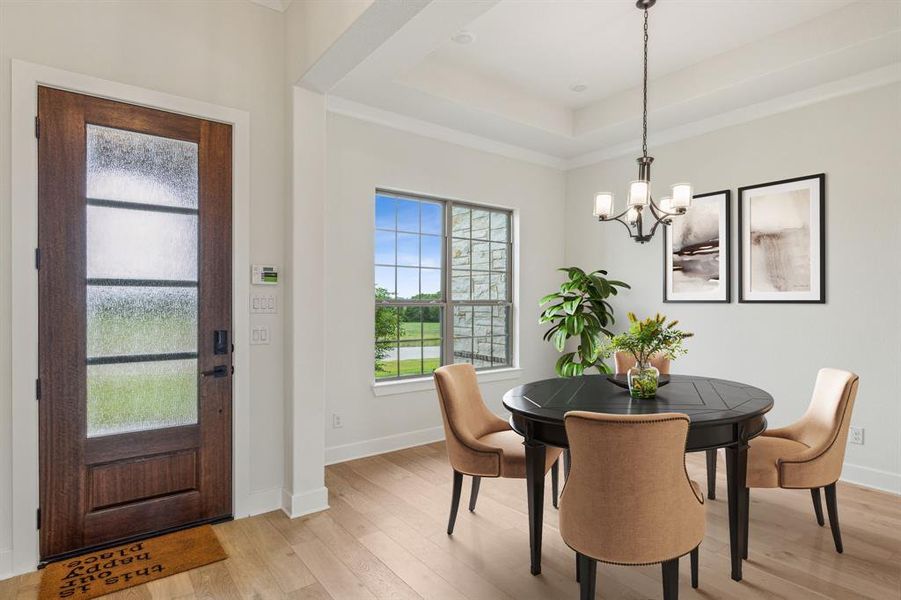 Entry of house by dining area *VIRTUAL STAGING