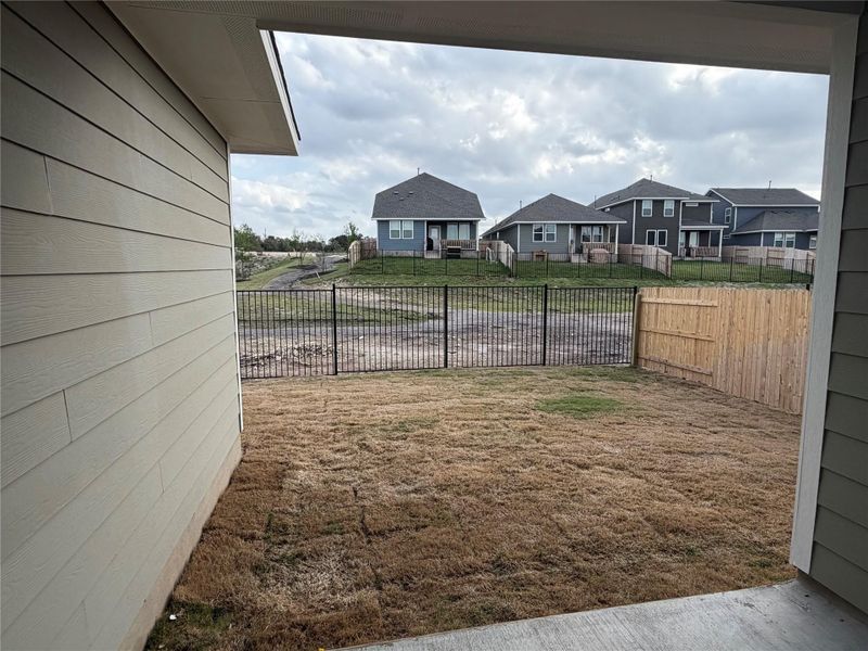 Exterior details and patio area of a home in Cannon Ranch, Dripping Springs (Image 3).