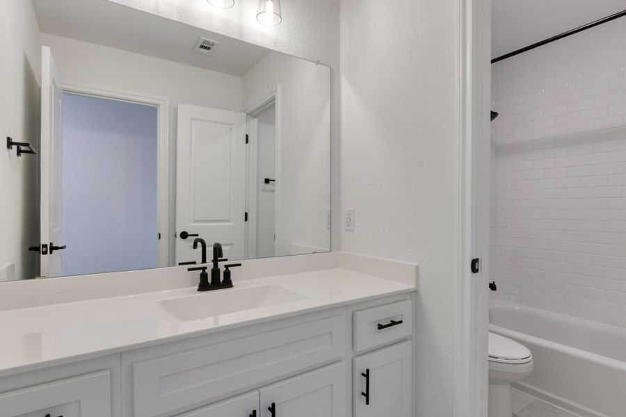 Representative furnished interior of a home built from the Nathaniel by Ashton Woods in Megan's Landing 70's, Castroville (Image 9).