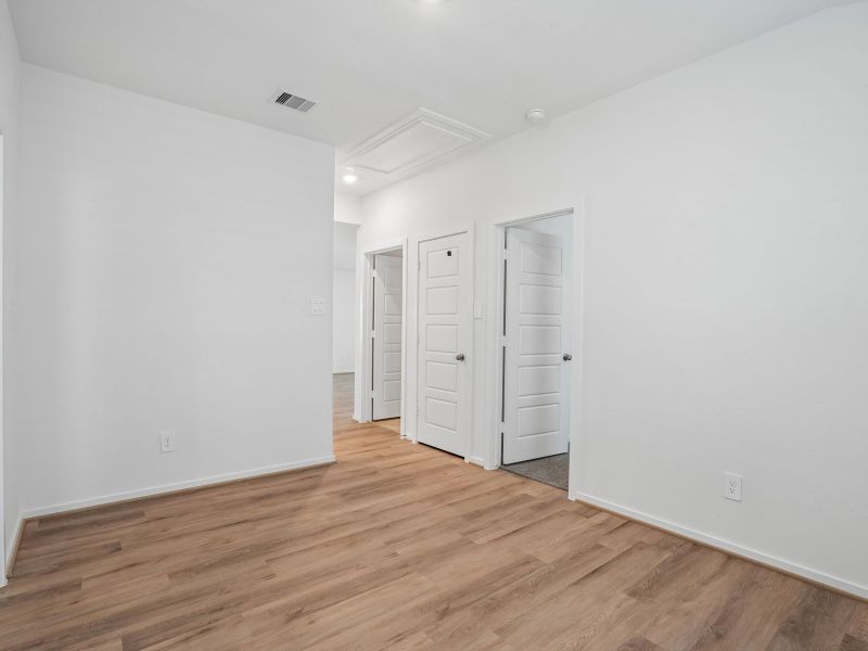 Spacious, unfurnished interior of a new home in Granger Pointe - Premier Series, Conroe (Image 12). Spacious, unfurnished interior of a new home in Granger Pointe - Premier Series, Conroe (Image 12).