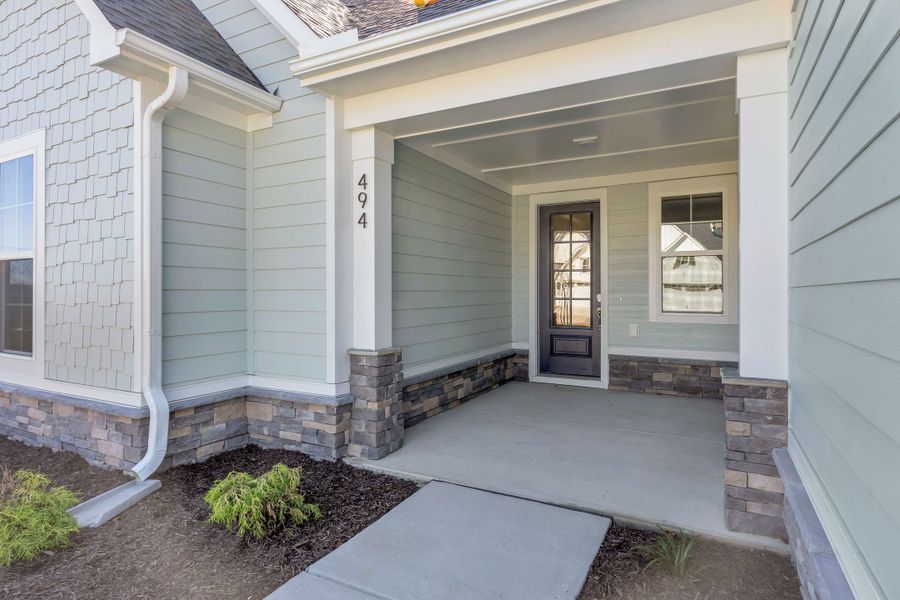 Representative exterior details of a home built from the The Bradley by RobuckHomes in Windwater, Hampstead (Image 37).
