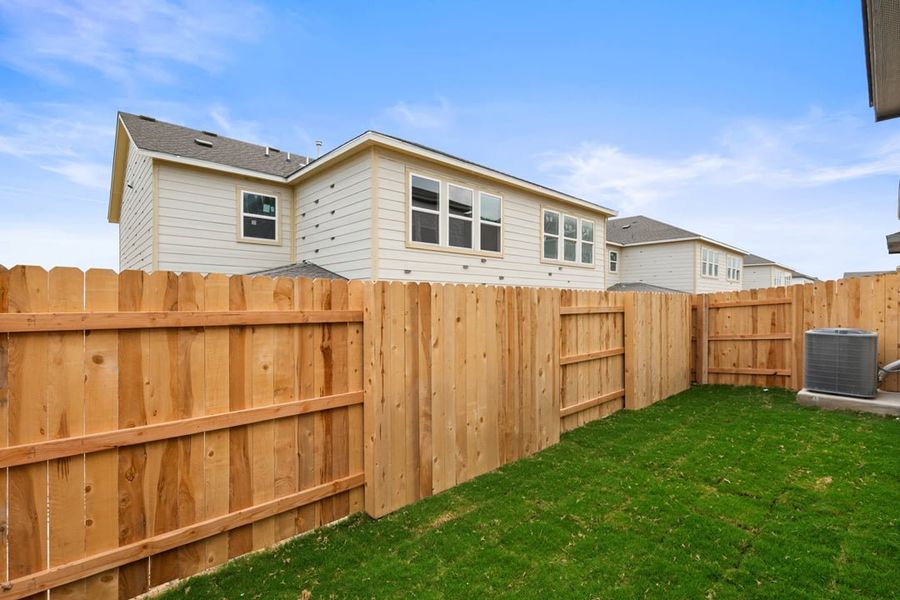 Exterior details and patio area of a home in Union Collection at Park Central, Georgetown (Image 28).