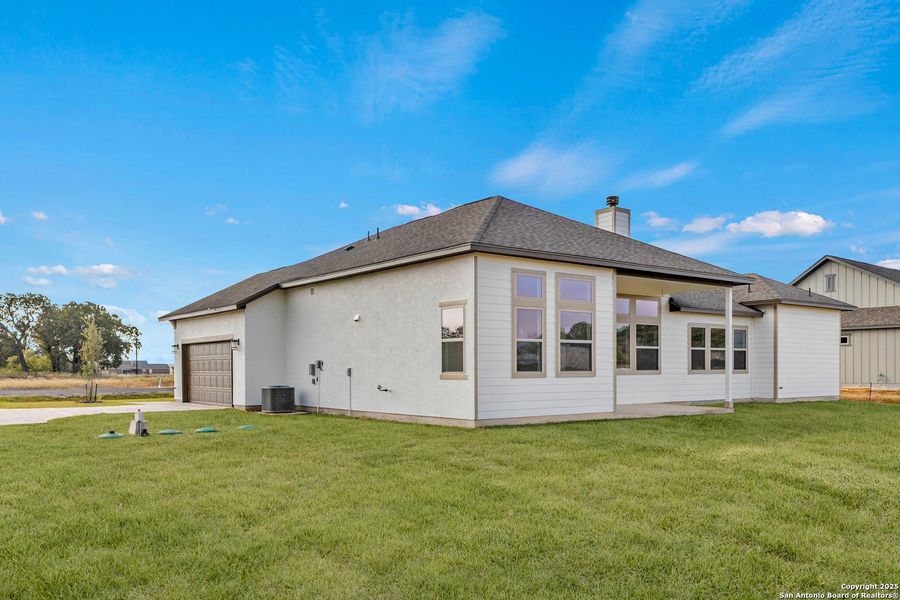 Exterior details and patio area of a home in Pradera Ridge, Floresville (Image 19). Exterior details and patio area of a home in Pradera Ridge, Floresville (Image 19).