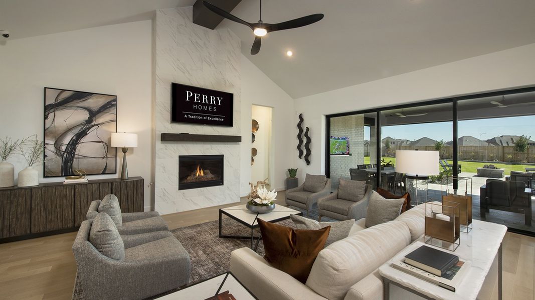 Representative furnished interior of a home built from the 3478W by Perry Homes in Lakes of Cane Island, Katy (Image 5).