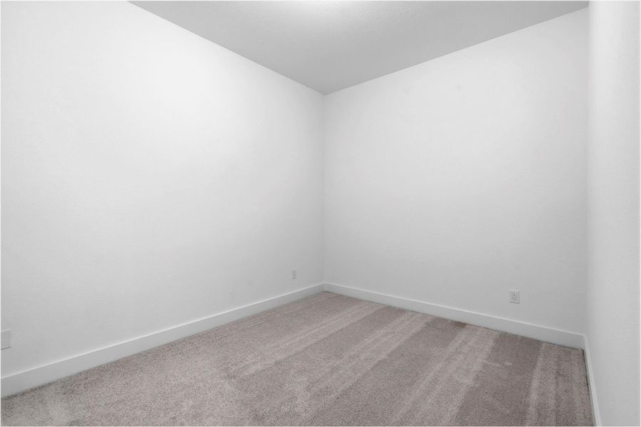 Spacious, unfurnished interior of a new home in Hunters Crossing, Sealy (Image 26).