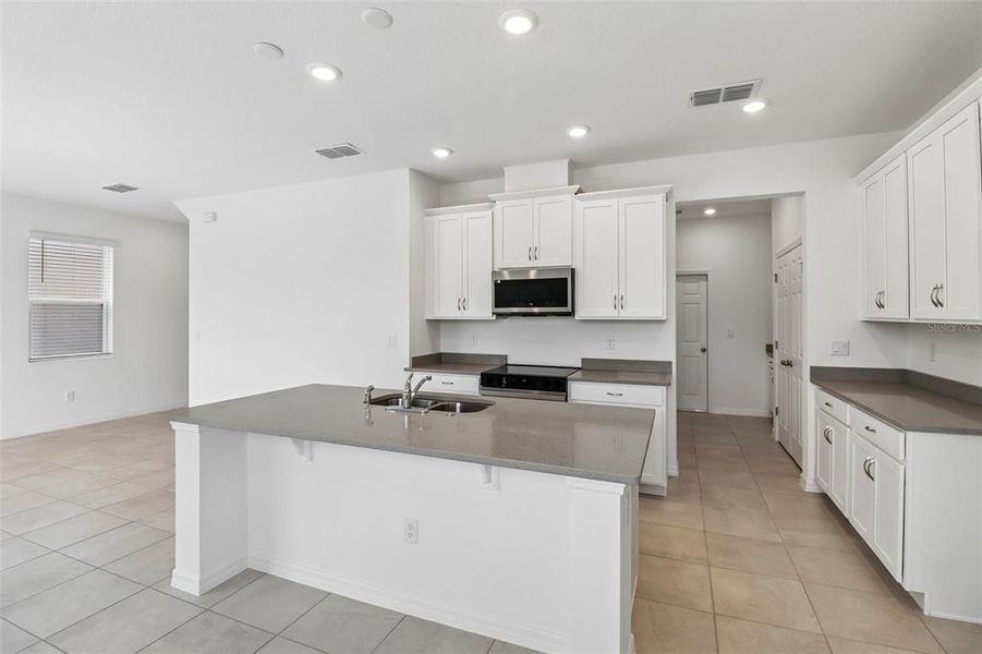 Furnished interior view inside a new home in Beresford Woods, Deland (Image 5).