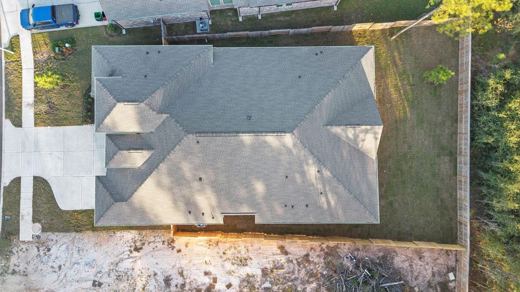 Exterior details and patio area of a home in Evergreen, Conroe (Image 23).