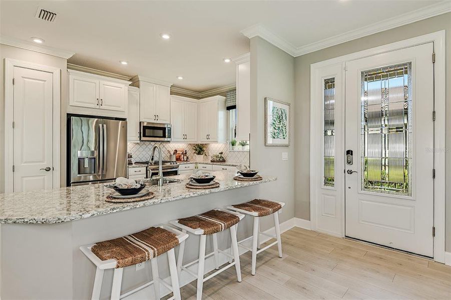 Furnished interior view inside a new home in Esplanade at Azario Lakewood Ranch, Bradenton (Image 30).