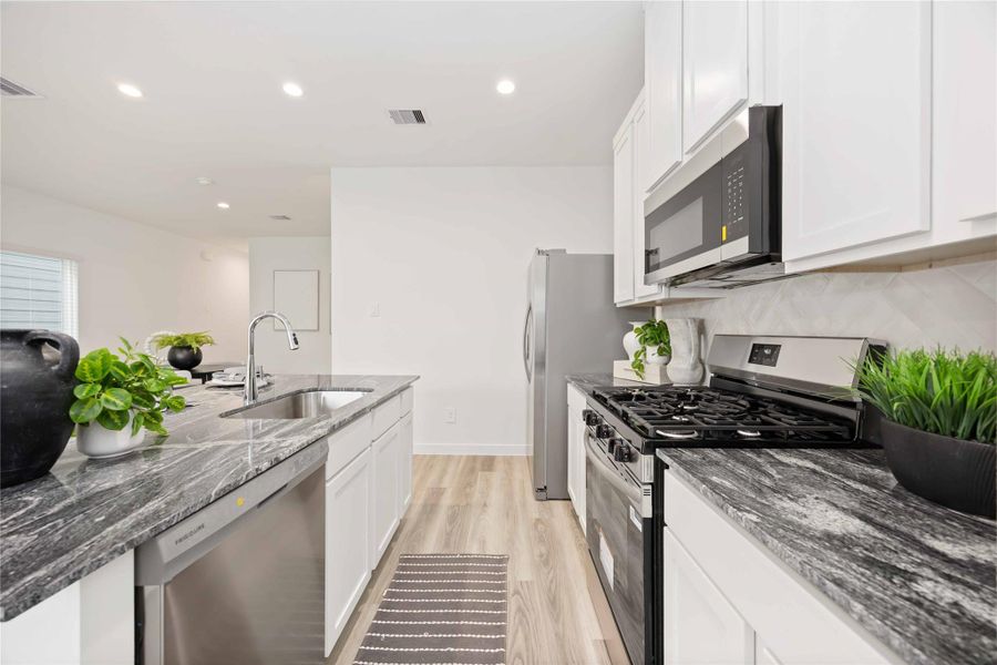 Furnished interior view inside a new home in Grand West, Houston (Image 9).